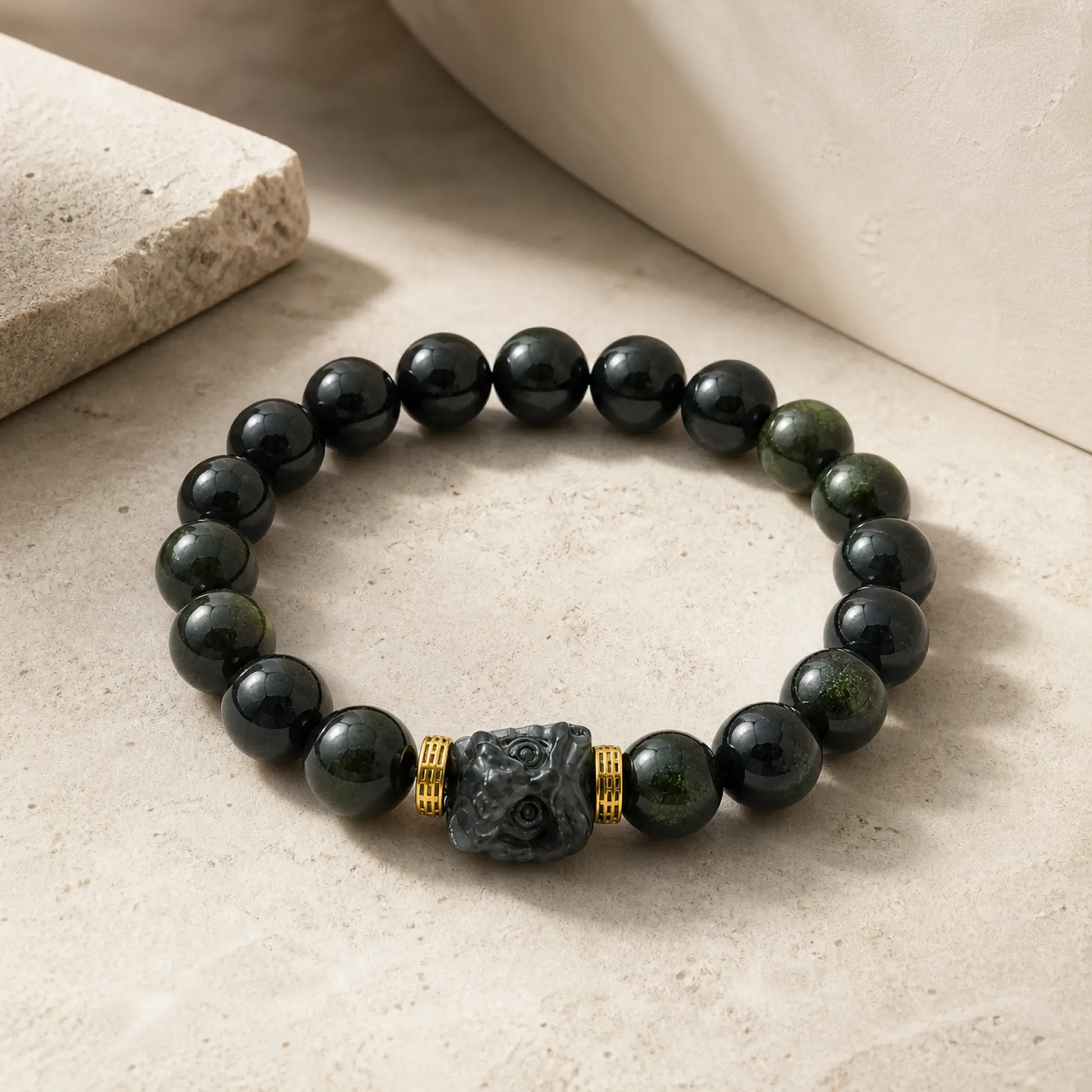 Guardian Deity Carved Bracelet | Black Obsidian & 18K Gold - lifestyle scene