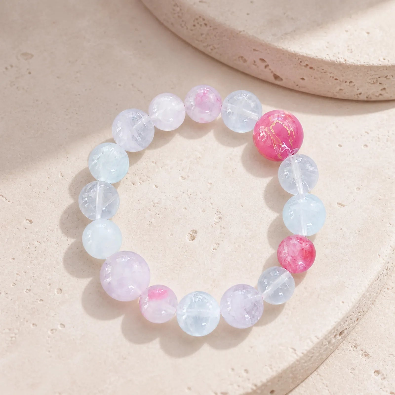 Rose Quartz Series Mixed Crystal Bracelet - on minimalist stone surface