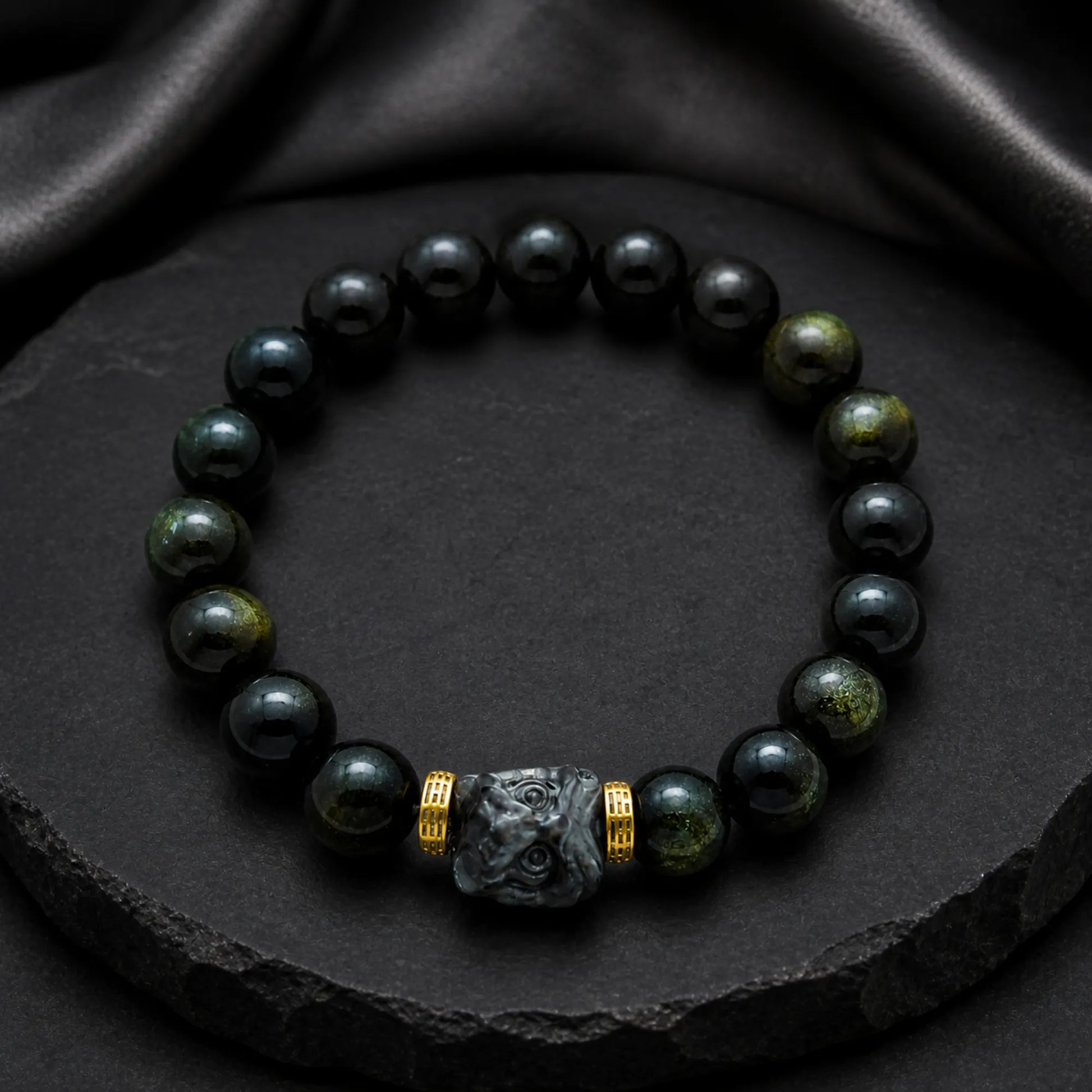 Guardian Deity Carved Bracelet | Black Obsidian & 18K Gold - lifestyle scene 2