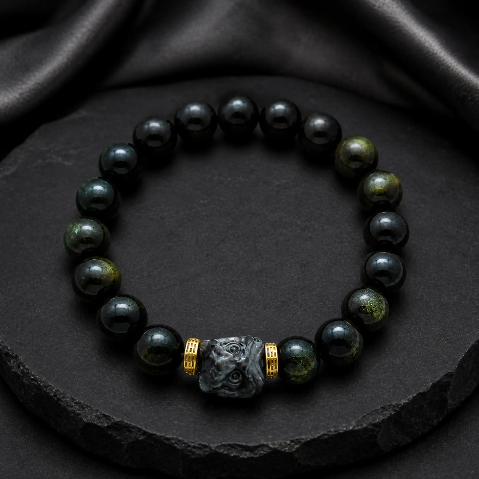 Guardian Deity Carved Bracelet | Black Obsidian & 18K Gold - lifestyle scene 2